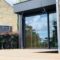 Veranda en acier noir sur une terrasse en bois construite par Florian Huet